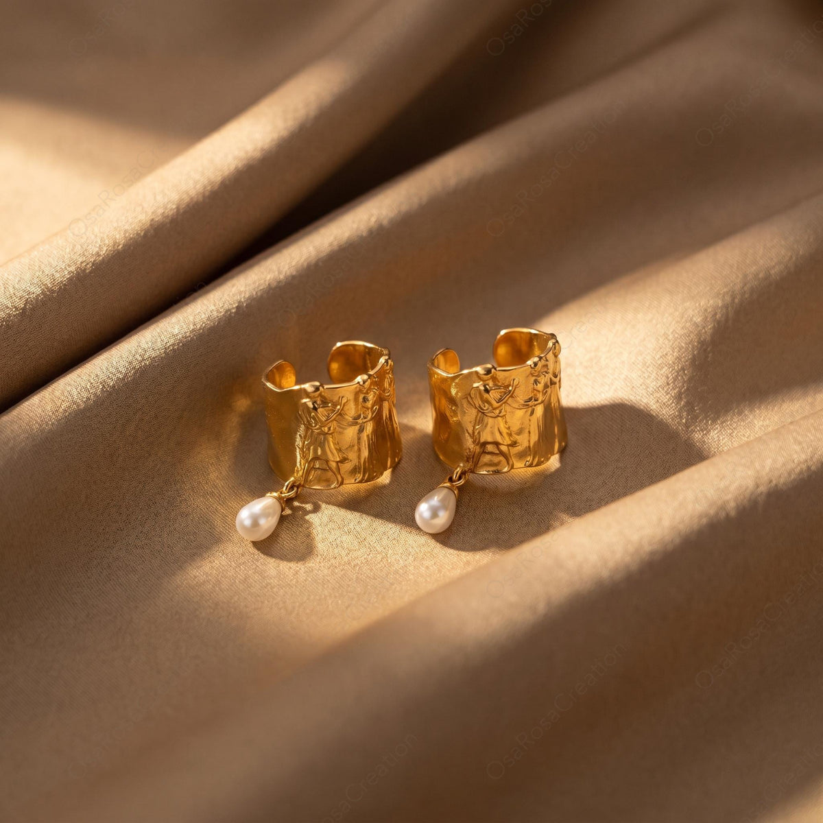 Boucles d'oreilles pendantes perlées en relief