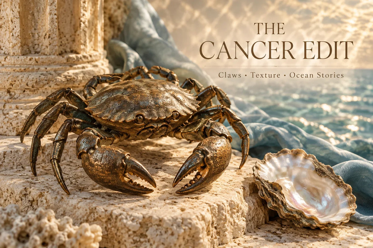 Crab sculpture and oyster shell introducing Cancer jewelry symbolism