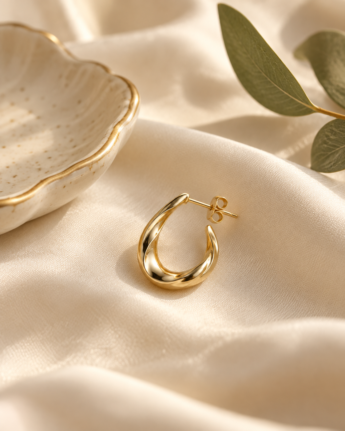 Gold earring styling for sensitive ears