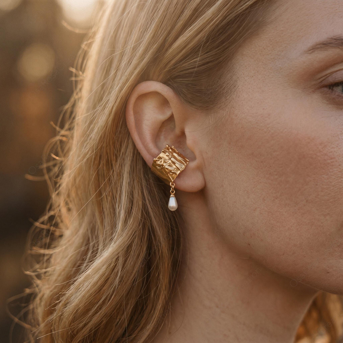 Boucles d'oreilles pendantes perlées en relief