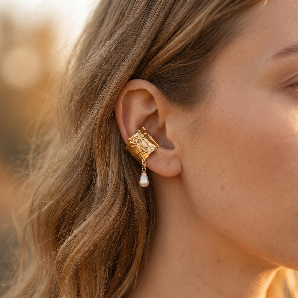 Boucles d'oreilles pendantes perlées en relief