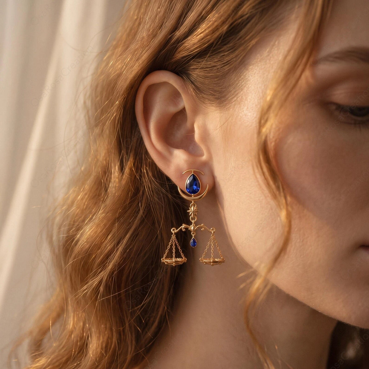 Side view of Celestial Balance Libra statement earrings